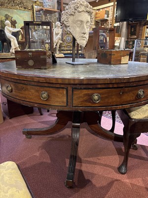 Lot 139 - A Regency style mahogany drum table with green...
