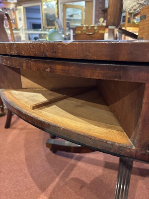Lot 139 - A Regency style mahogany drum table with green...