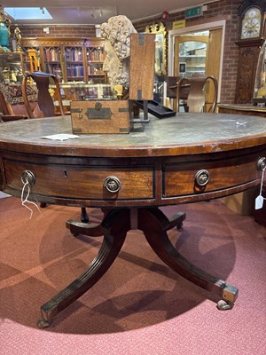 Lot 139 - A Regency style mahogany drum table with green...