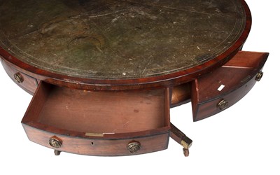Lot 139 - A Regency style mahogany drum table with green...