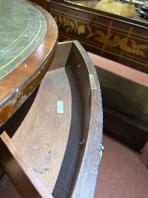 Lot 139 - A Regency style mahogany drum table with green...