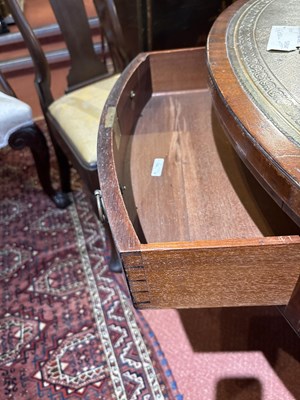 Lot 139 - A Regency style mahogany drum table with green...