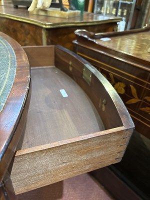 Lot 139 - A Regency style mahogany drum table with green...