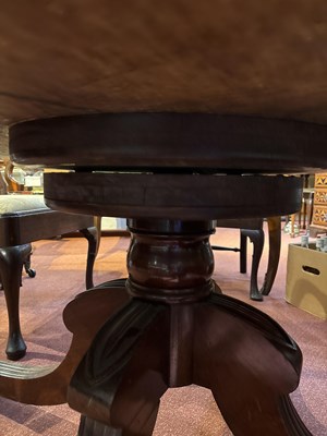 Lot 139 - A Regency style mahogany drum table with green...