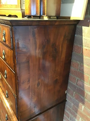 Lot 140 - A George II figured rosewood chest on chest...
