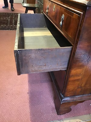 Lot 140 - A George II figured rosewood chest on chest...