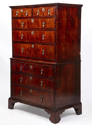 Lot 140 - A George II figured rosewood chest on chest...
