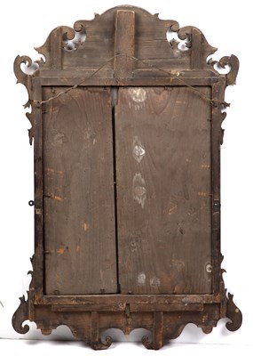 Lot 150 - A George II fret framed wall mirror, 85cm high