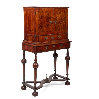 Lot 143 - A Queen Anne and later walnut cabinet on a...