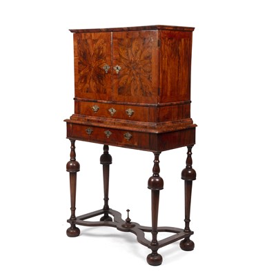 Lot 143 - A Queen Anne and later walnut cabinet on a...