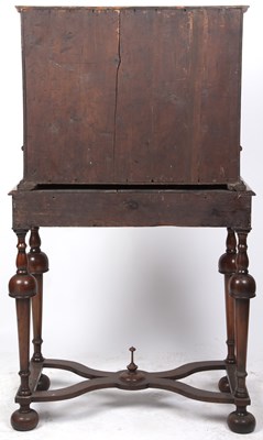 Lot 143 - A Queen Anne and later walnut cabinet on a...