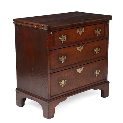 Lot 164 - A Georgian oak bachelor's chest with a fold...