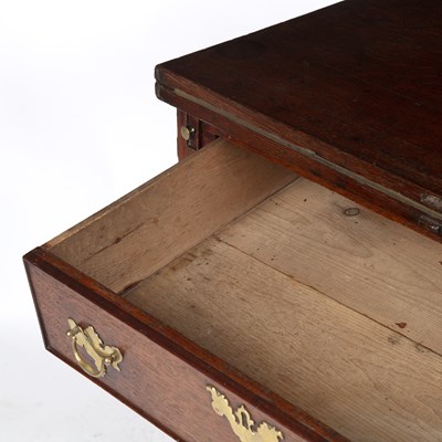 Lot 164 - A Georgian oak bachelor's chest with a fold...