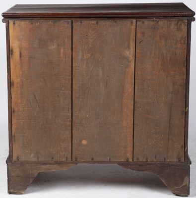Lot 164 - A Georgian oak bachelor's chest with a fold...