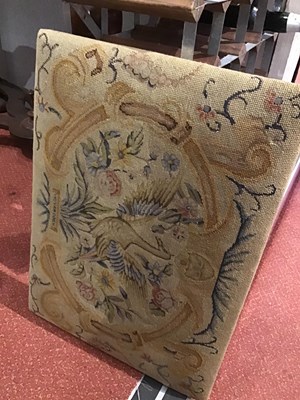 Lot 165 - An 18th century walnut stool with tapestry...