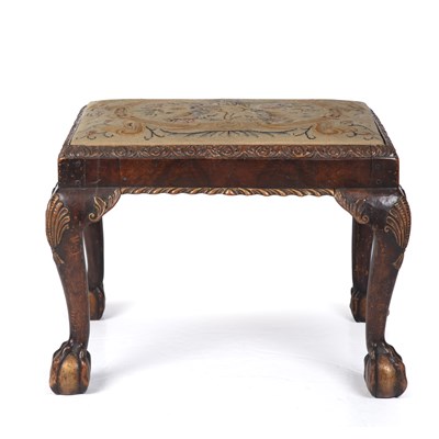 Lot 165 - An 18th century walnut stool with tapestry...