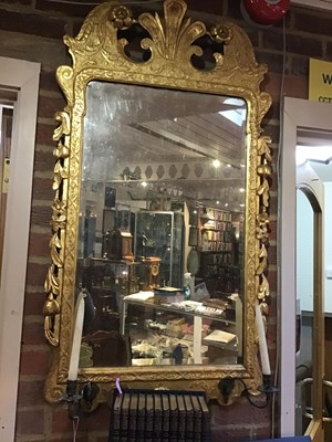Lot 136 - A George I giltwood wall mirror with bevelled...