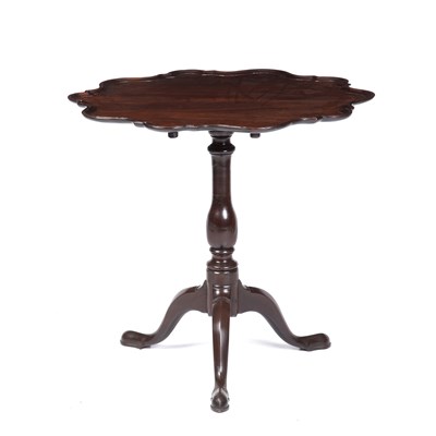 Lot 137 - A George III mahogany piecrust tilt top table,...