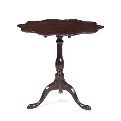 Lot 137 - A George III mahogany piecrust tilt top table,...