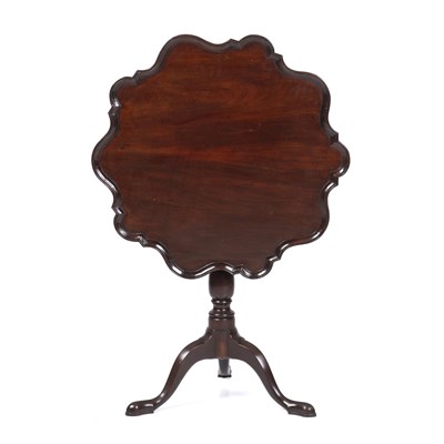 Lot 137 - A George III mahogany piecrust tilt top table,...