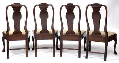 Lot 162 - A set of four George II mahogany chairs with...