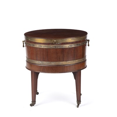 Lot 173 - A George III mahogany oval cellarette with a...