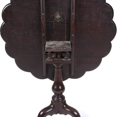 Lot 163 - A 19th century black walnut tilt top supper...