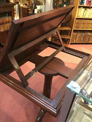Lot 174 - A George III mahogany reading table with...
