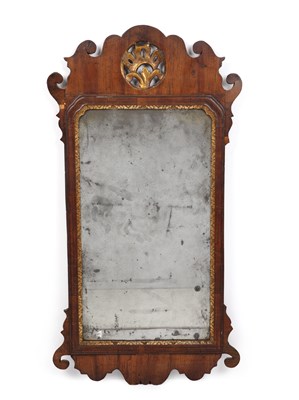 Lot 151 - A George III mahogany fret frame wall mirror,...