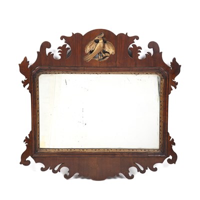 Lot 152 - A Georgian walnut fret framed wall mirror with...