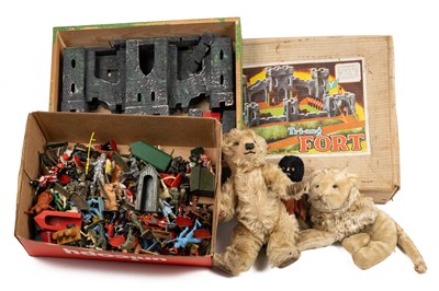 Lot 231 - A collection of toys and teddys