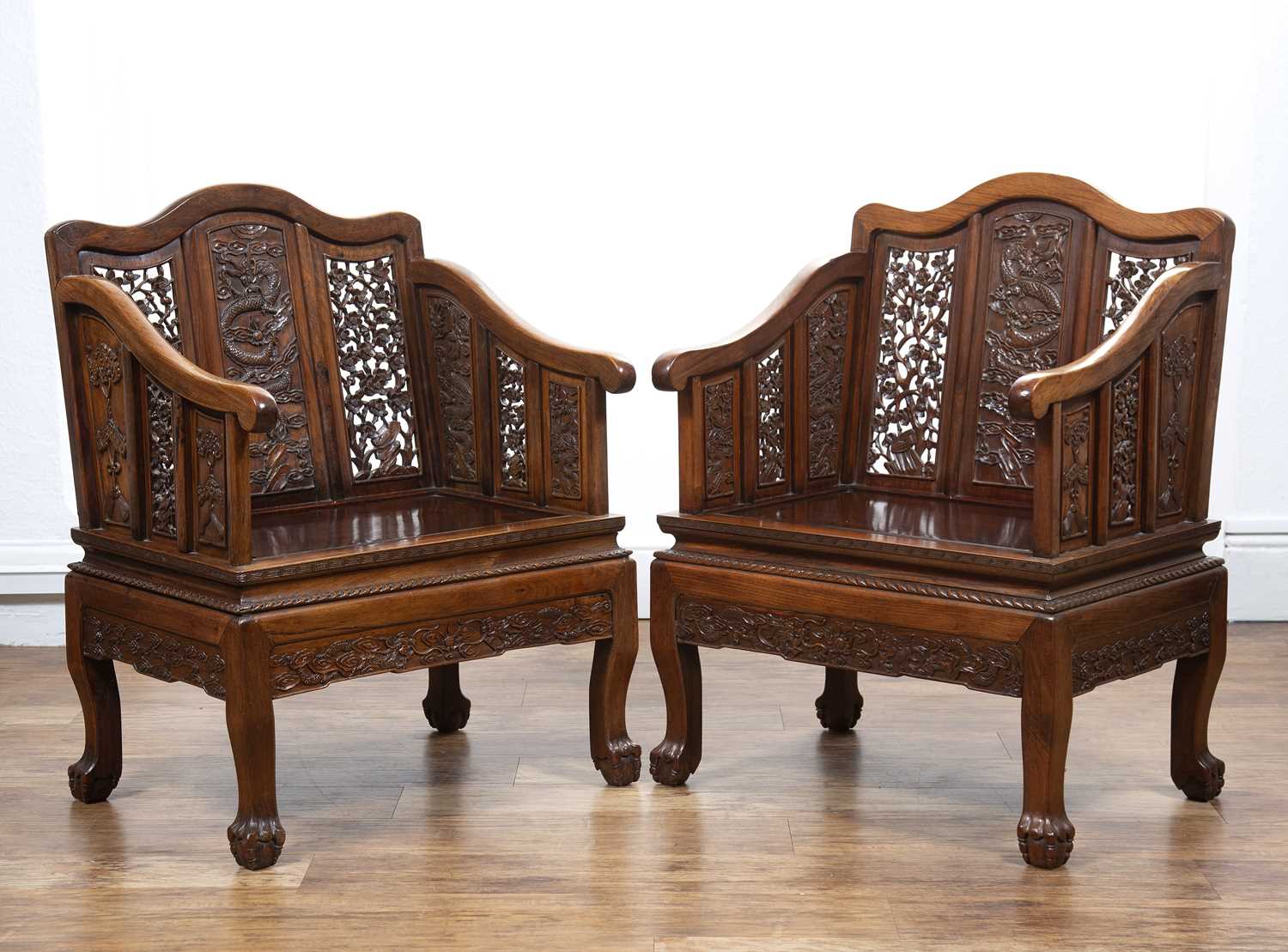 Lot 474A - Pair of Ming-style carved hardwood armchairs...