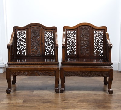 Lot 96 - Pair of Ming-style carved hardwood armchairs...