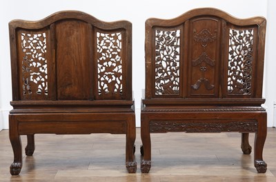 Lot 96 - Pair of Ming-style carved hardwood armchairs...
