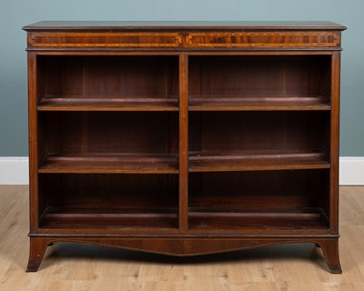 Lot 440 - A pair of Edwardian open-fronted bookcases...