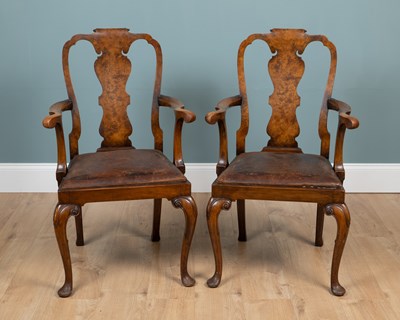 Lot 29 - A pair of George I-style walnut open armchairs