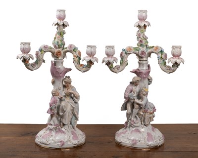 Lot 33 - A pair of Continental porcelain candelabra