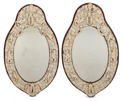 Lot 3 - A pair of early 19th century Dieppe-style bone-mounted mirrors