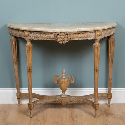 Lot 48 - A Continental marble-topped limed oak console table