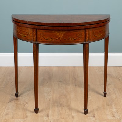 Lot 40 - A George III satinwood, inlaid demi-lune card table