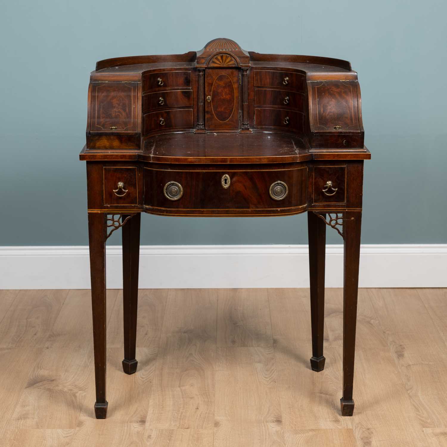 Lot 21 - A 19th century Chippendale-style Carlton House desk