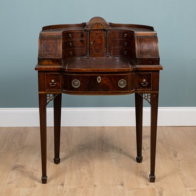 Lot 21 - A 19th century Chippendale-style Carlton House desk