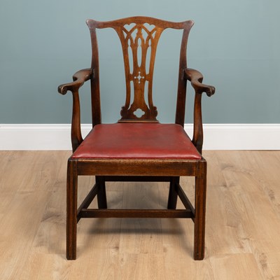 Lot 6 - A Georgian Chippendale-style mahogany elbow chair