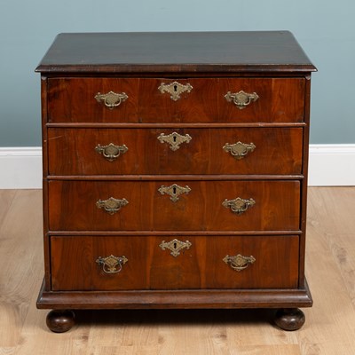 Lot 7 - An early 18th century walnut-veneered chest of drawers