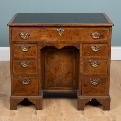 Lot 22 - A Georgian burr walnut kneehole desk