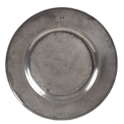 Lot 27 - A 17th century broad rim pewter charger by...