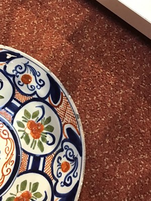 Lot 110 - An 18th century Delft polychrome plate...
