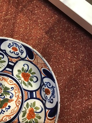 Lot 110 - An 18th century Delft polychrome plate...