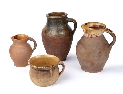 Lot 101 - A collection of four post-Medieval jugs, circa...