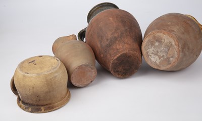 Lot 101 - A collection of four post-Medieval jugs, circa...